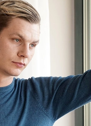 Gorgeous blonde stud Damion Diesel strokes his cock.