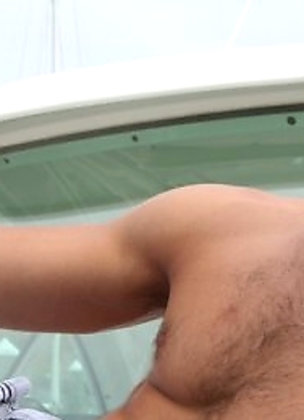 Adam posing naked outdoors